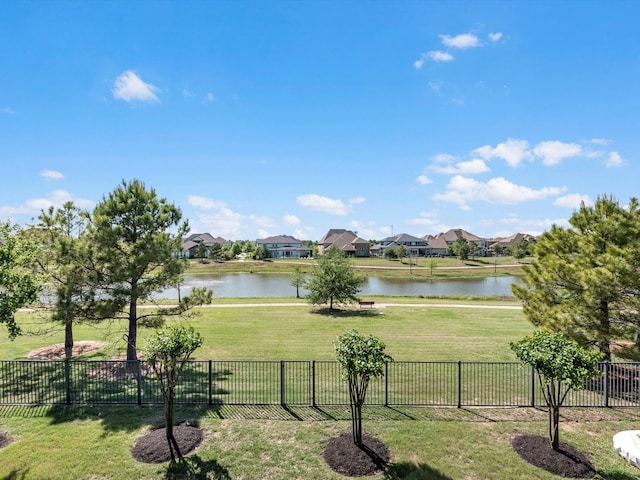 16819 Himley Dr, Cypress, TX 77433 - water view with nearby suburban area and a fenced backyard