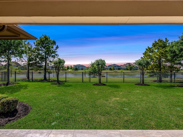 16819 Himley Dr, Cypress, TX 77433 - yard at dusk featuring a water view and a residential view