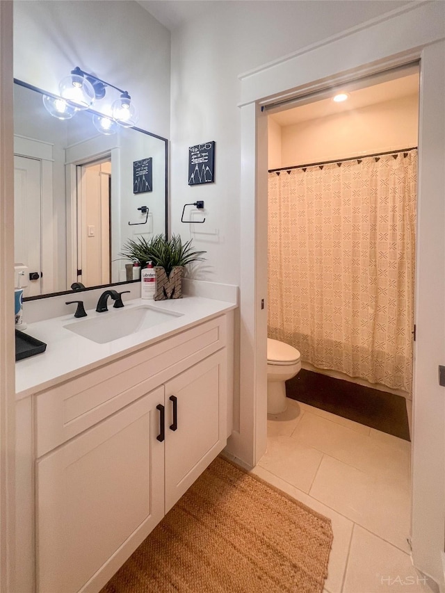 5402 Wheatley St Unit D, Houston, TX 77091 - full bath featuring toilet, vanity, tile patterned flooring, and a shower with shower curtain