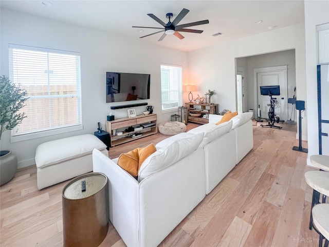 5402 Wheatley St Unit D, Houston, TX 77091 - living room with light wood finished floors and ceiling fan