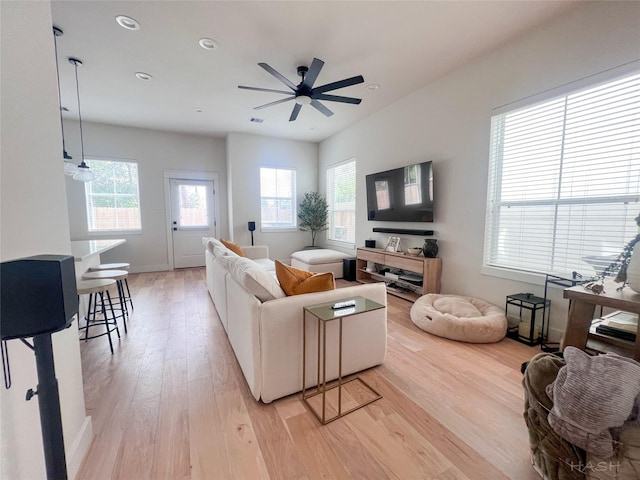 5402 Wheatley St Unit D, Houston, TX 77091 - living room with light wood finished floors, plenty of natural light, a ceiling fan, and recessed lighting