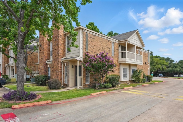 2626 Holly Hall St Unit 1102, Houston, TX 77054 - view of property featuring uncovered parking and central AC