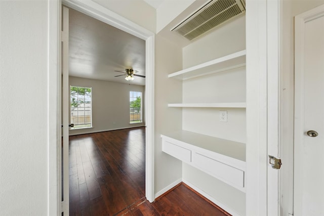 2626 Holly Hall St Unit 1102, Houston, TX 77054 - hallway featuring dark wood-type flooring, baseboards, and an office area