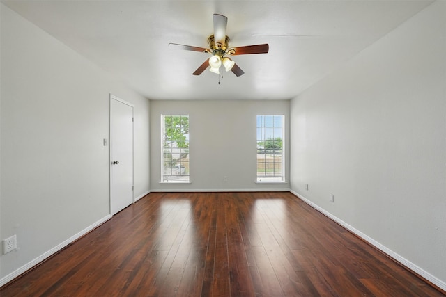 2626 Holly Hall St Unit 1102, Houston, TX 77054 - empty room featuring a ceiling fan, baseboards, and dark wood-type flooring
