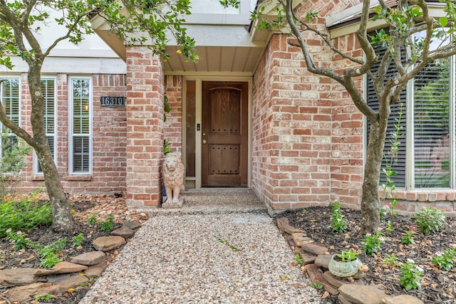 16310 Sir William Dr, Spring, TX 77379 - view of exterior entry with brick siding
