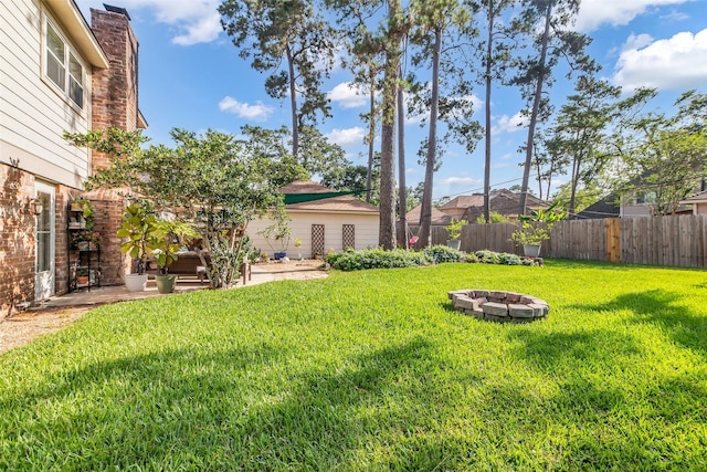 16310 Sir William Dr, Spring, TX 77379 - view of yard with an outdoor fire pit and a patio area