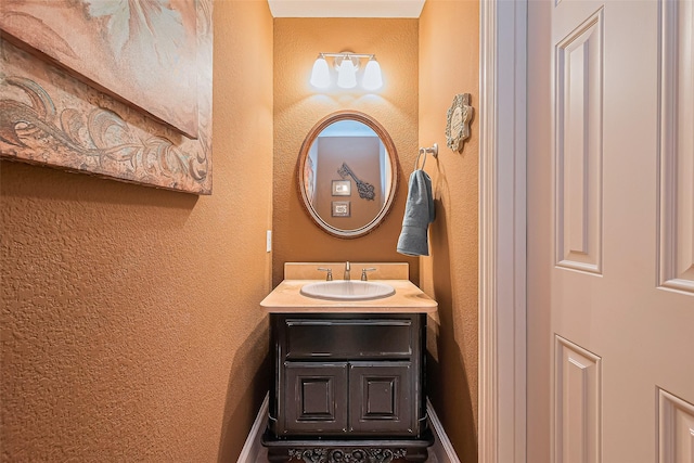 11907 Wind Cove Place Ct, Humble, TX 77346 - bathroom featuring vanity and a textured wall