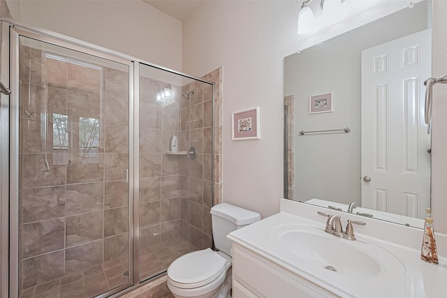 11907 Wind Cove Place Ct, Humble, TX 77346 - full bathroom with toilet, a shower stall, and vanity