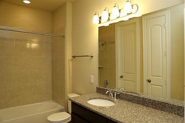 4914 Ava Meadows Ln, Sugar Land, TX 77479 - full bathroom featuring a textured wall, vanity, shower / bathtub combination, and toilet