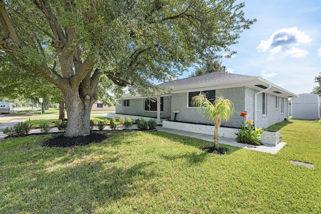 2701 Oaks Dr, Pasadena, TX 77502 - ranch-style home featuring a front yard and brick siding