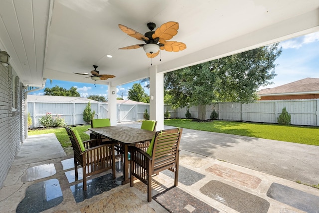 2701 Oaks Dr, Pasadena, TX 77502 - view of patio featuring outdoor dining space and ceiling fan