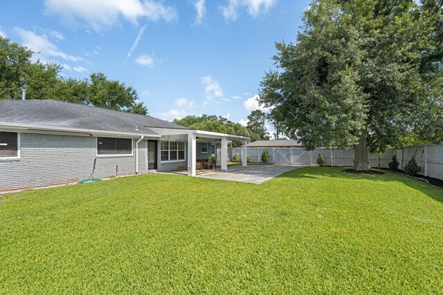 2701 Oaks Dr, Pasadena, TX 77502 - back of house featuring a patio and brick siding