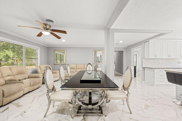 2701 Oaks Dr, Pasadena, TX 77502 - dining room featuring crown molding, light marble finish floors, a ceiling fan, and recessed lighting
