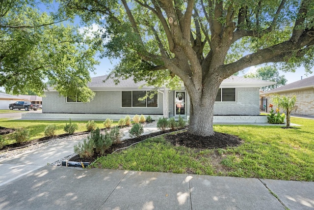 2701 Oaks Dr, Pasadena, TX 77502 - view of front of property with brick siding and a front lawn