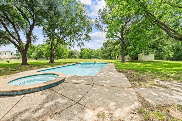 21310 Rosehill Church Rd, Tomball, TX 77377 - outdoor pool featuring an in-ground hot tub, a patio area, view of wooded area, and an outdoor structure