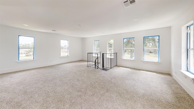 21310 Rosehill Church Rd, Tomball, TX 77377 - spare room featuring healthy amount of natural light, light carpet, and baseboards