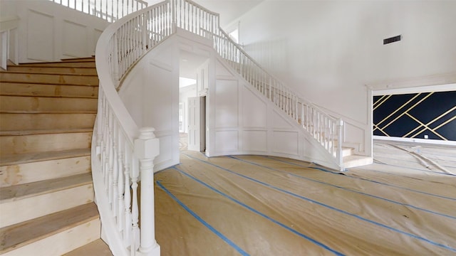 21310 Rosehill Church Rd, Tomball, TX 77377 - stairs with a high ceiling and a decorative wall