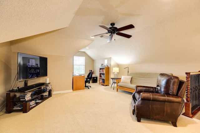 51 Northwood Ct, Lake Jackson, TX 77566 - living area with a desk, lofted ceiling, a textured ceiling, baseboards, and a ceiling fan