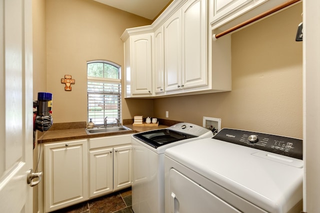 51 Northwood Ct, Lake Jackson, TX 77566 - laundry room featuring washing machine and dryer and cabinet space