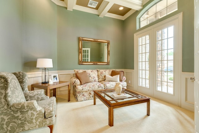 51 Northwood Ct, Lake Jackson, TX 77566 - living room with beamed ceiling, ornamental molding, coffered ceiling, carpet flooring, and a decorative wall