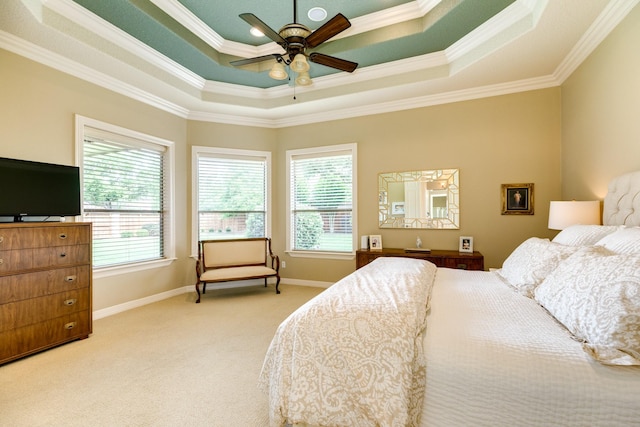 51 Northwood Ct, Lake Jackson, TX 77566 - bedroom featuring light carpet, ornamental molding, a tray ceiling, baseboards, and a ceiling fan