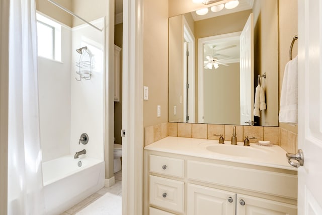 51 Northwood Ct, Lake Jackson, TX 77566 - full bath featuring toilet, shower / bath combo with shower curtain, vanity, a ceiling fan, and tile patterned floors