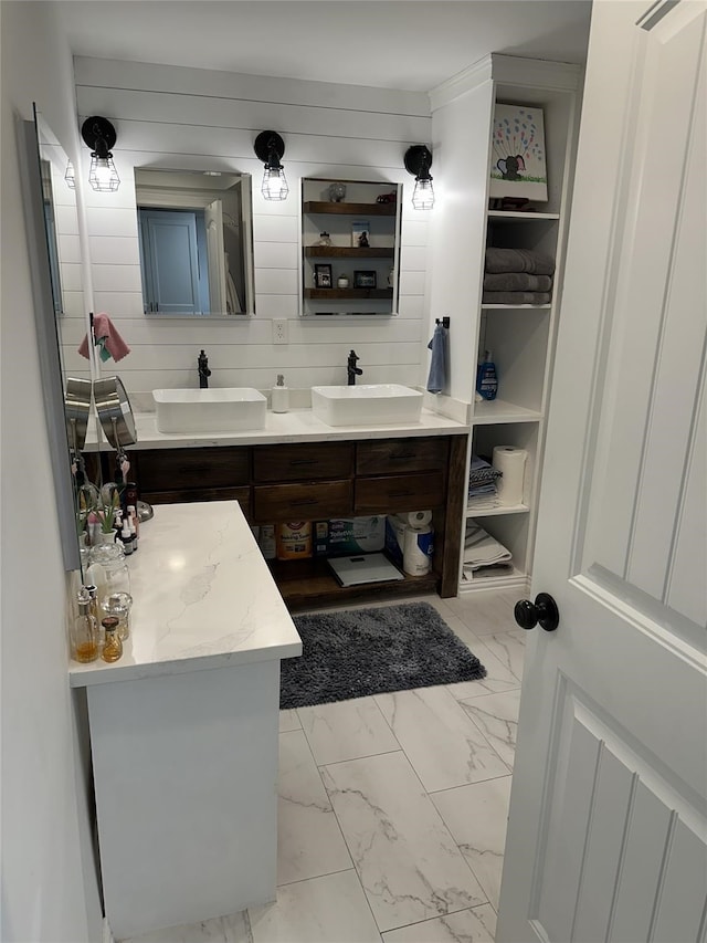 2044 Des Jardines St, Houston, TX 77023 - bathroom with double vanity and marble finish flooring