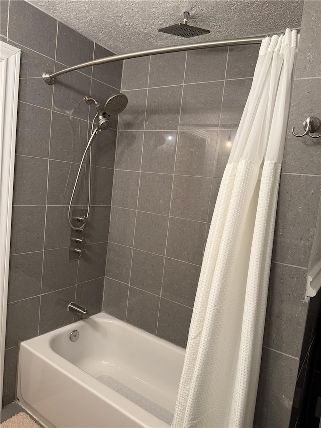 2044 Des Jardines St, Houston, TX 77023 - full bathroom featuring a combined bath / shower with rainfall shower