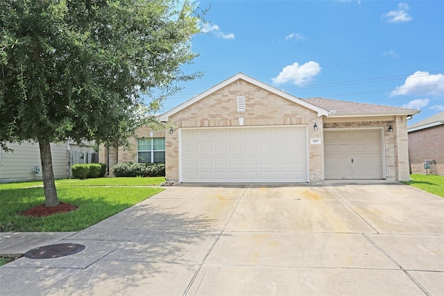 7027 Parkford Meadow Dr, Cypress, TX 77433 - single story home featuring brick siding, driveway, a garage, and a front lawn