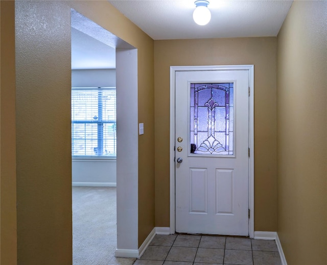 7027 Parkford Meadow Dr, Cypress, TX 77433 - entrance foyer with baseboards and light tile patterned flooring