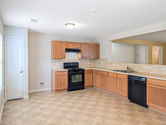 7027 Parkford Meadow Dr, Cypress, TX 77433 - kitchen with black appliances, under cabinet range hood, a sink, tasteful backsplash, and light countertops