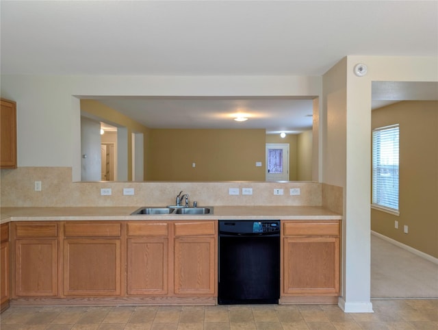 7027 Parkford Meadow Dr, Cypress, TX 77433 - kitchen featuring dishwasher, a sink, light countertops, decorative backsplash, and baseboards