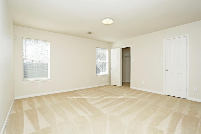 7027 Parkford Meadow Dr, Cypress, TX 77433 - unfurnished bedroom featuring light colored carpet and baseboards