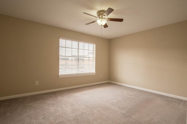 4064 Belle Park Dr Unit 4064, Houston, TX 77072 - spare room with baseboards, carpet, and ceiling fan
