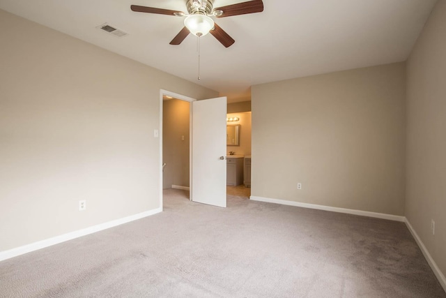 4064 Belle Park Dr Unit 4064, Houston, TX 77072 - empty room featuring a ceiling fan, light carpet, and baseboards
