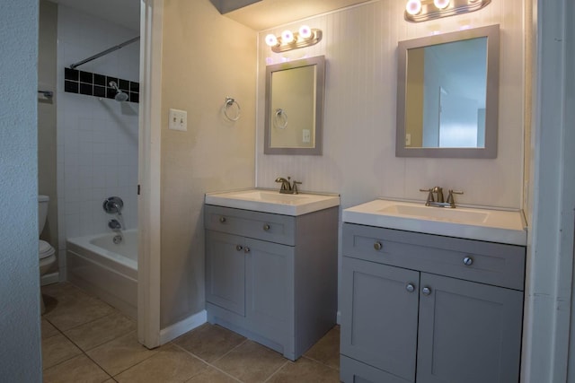 4064 Belle Park Dr Unit 4064, Houston, TX 77072 - bathroom with two vanities, toilet, tile patterned flooring, and tub / shower combination