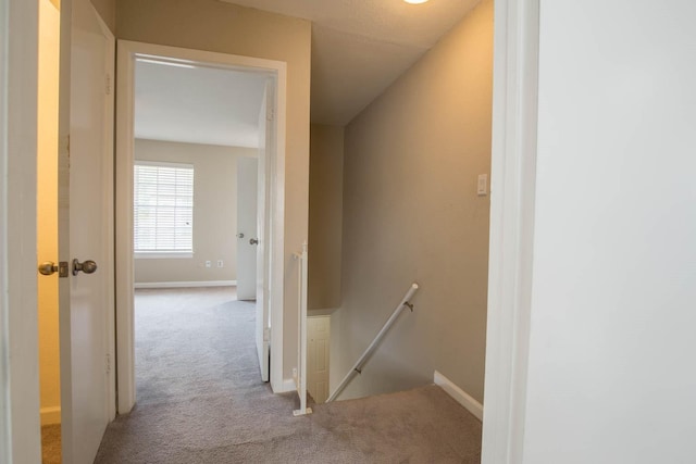 4064 Belle Park Dr Unit 4064, Houston, TX 77072 - corridor featuring an upstairs landing, carpet flooring, and baseboards