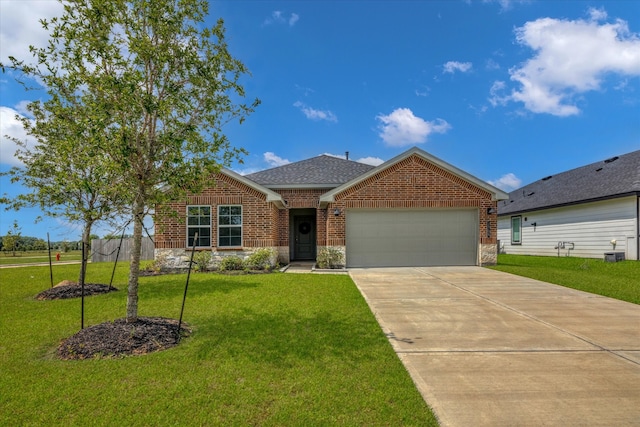 1709 Perch St, Alvin, TX 77511 - view of front of property with an attached garage, brick siding, concrete driveway, and a front yard