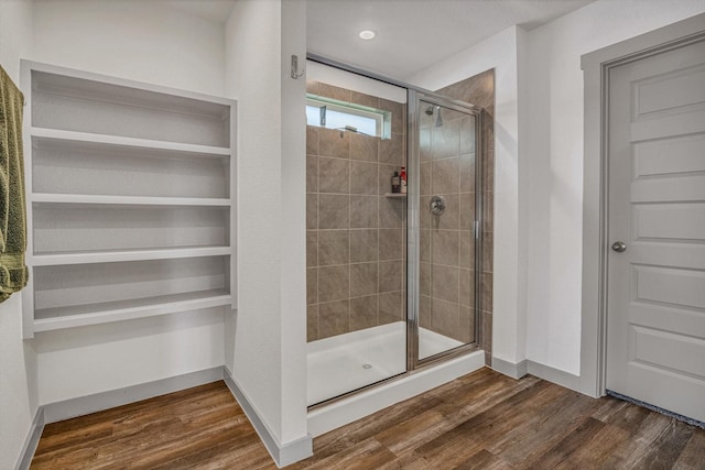 1709 Perch St, Alvin, TX 77511 - full bath featuring a shower stall, wood finished floors, baseboards, and recessed lighting