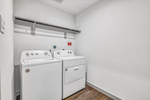 1709 Perch St, Alvin, TX 77511 - laundry area with independent washer and dryer, dark wood finished floors, and baseboards