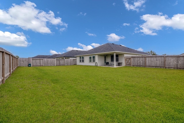 1709 Perch St, Alvin, TX 77511 - back of house featuring a patio area