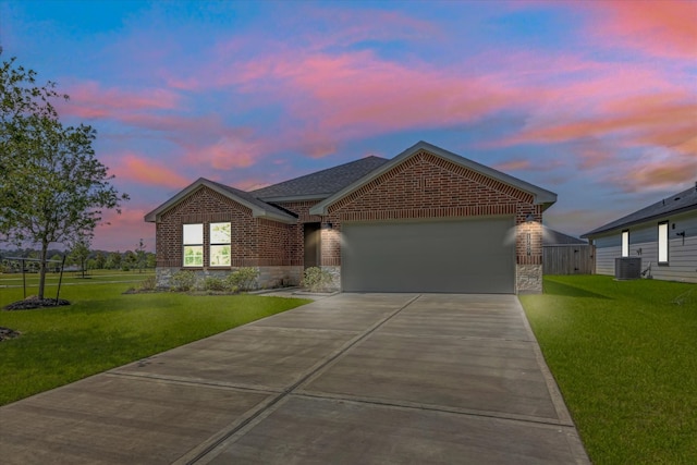 1709 Perch St, Alvin, TX 77511 - single story home with central air condition unit, driveway, a front lawn, and an attached garage