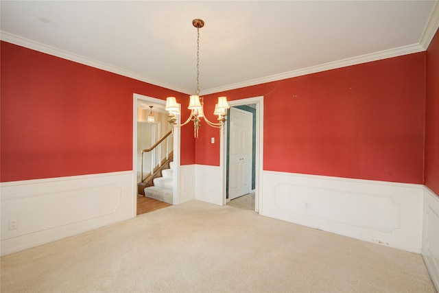 10902 Brentway Dr, Houston, TX 77070 - carpeted empty room with a chandelier, a wainscoted wall, crown molding, and stairs