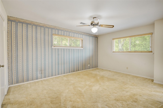 10902 Brentway Dr, Houston, TX 77070 - spare room with plenty of natural light, a ceiling fan, and carpet