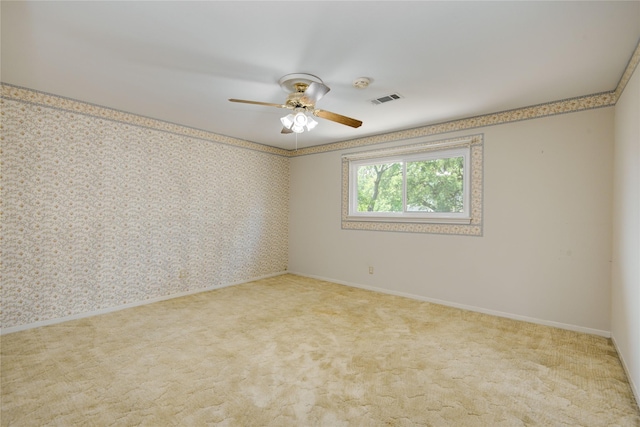 10902 Brentway Dr, Houston, TX 77070 - empty room with wallpapered walls, a ceiling fan, a smoke detector, and carpet flooring