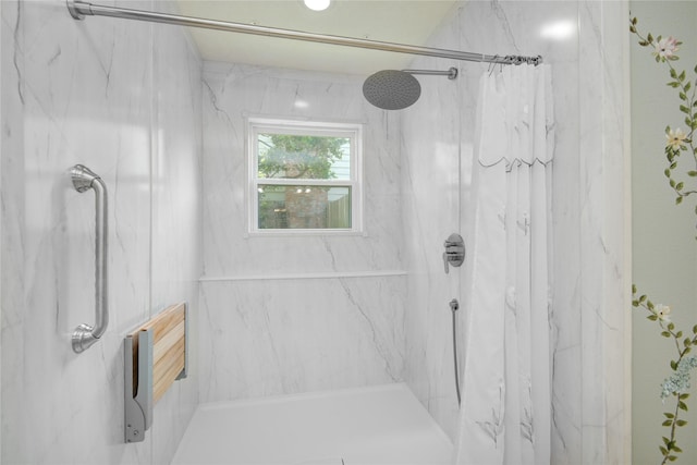 10902 Brentway Dr, Houston, TX 77070 - bathroom featuring a marble finish shower