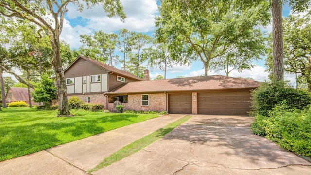 10902 Brentway Dr, Houston, TX 77070 - view of front of home with an attached garage, concrete driveway, a front lawn, brick siding, and a chimney
