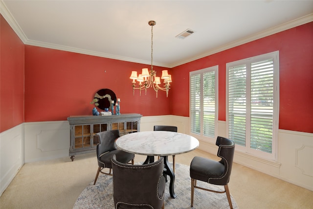 10902 Brentway Dr, Houston, TX 77070 - dining room with carpet floors, wainscoting, a chandelier, and ornamental molding