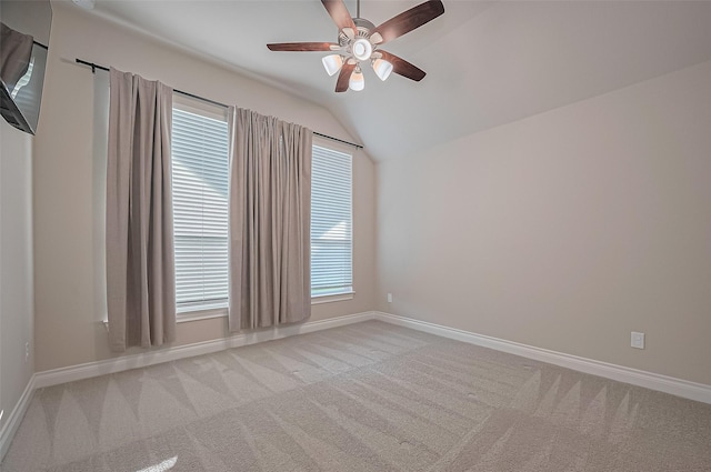 17414 Orchid Falls Ln, Conroe, TX 77302 - spare room with light carpet, a ceiling fan, vaulted ceiling, and plenty of natural light