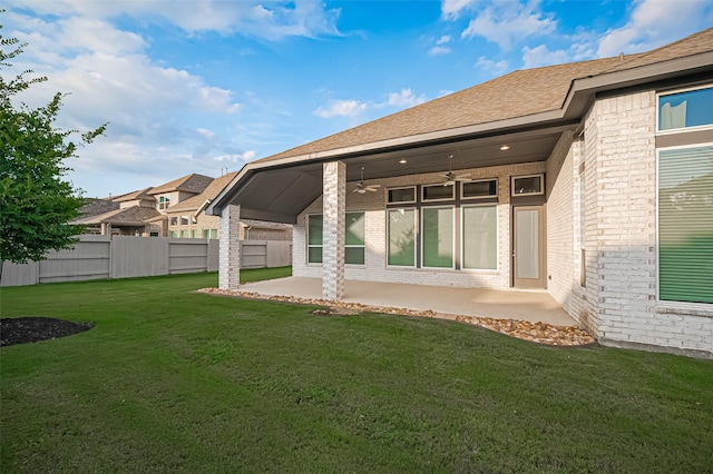 17414 Orchid Falls Ln, Conroe, TX 77302 - rear view of house featuring brick siding, a patio, ceiling fan, and a shingled roof